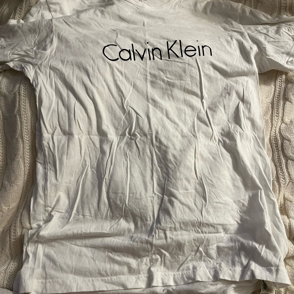 Calvin Klein white t shirt in size medium